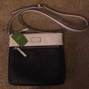 Kate Spade cross body black & white purse.